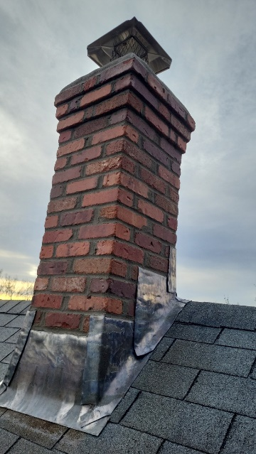 A small masonry chimney.